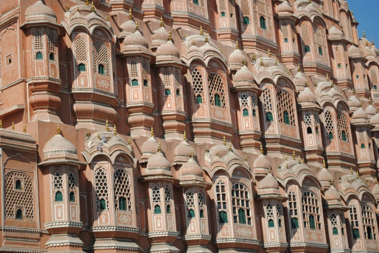 a large building with many windows and balconies