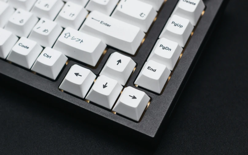 closeup view of a computer keyboard and its black keys