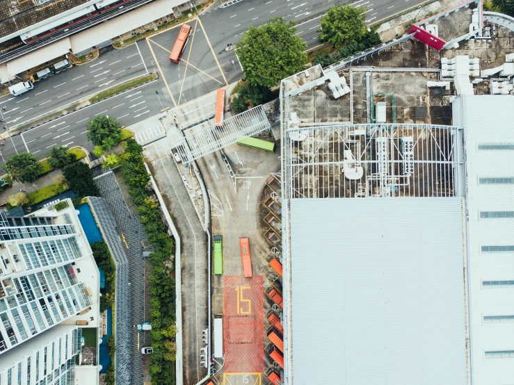 an overhead view of a warehouse on a city street