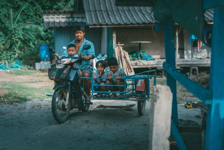 an image of a group of people riding on a bike