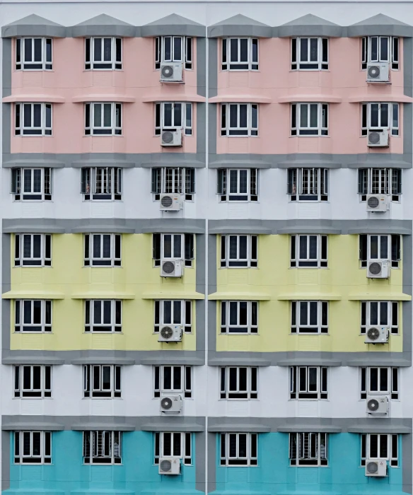 four images of some building with many windows and three small windows