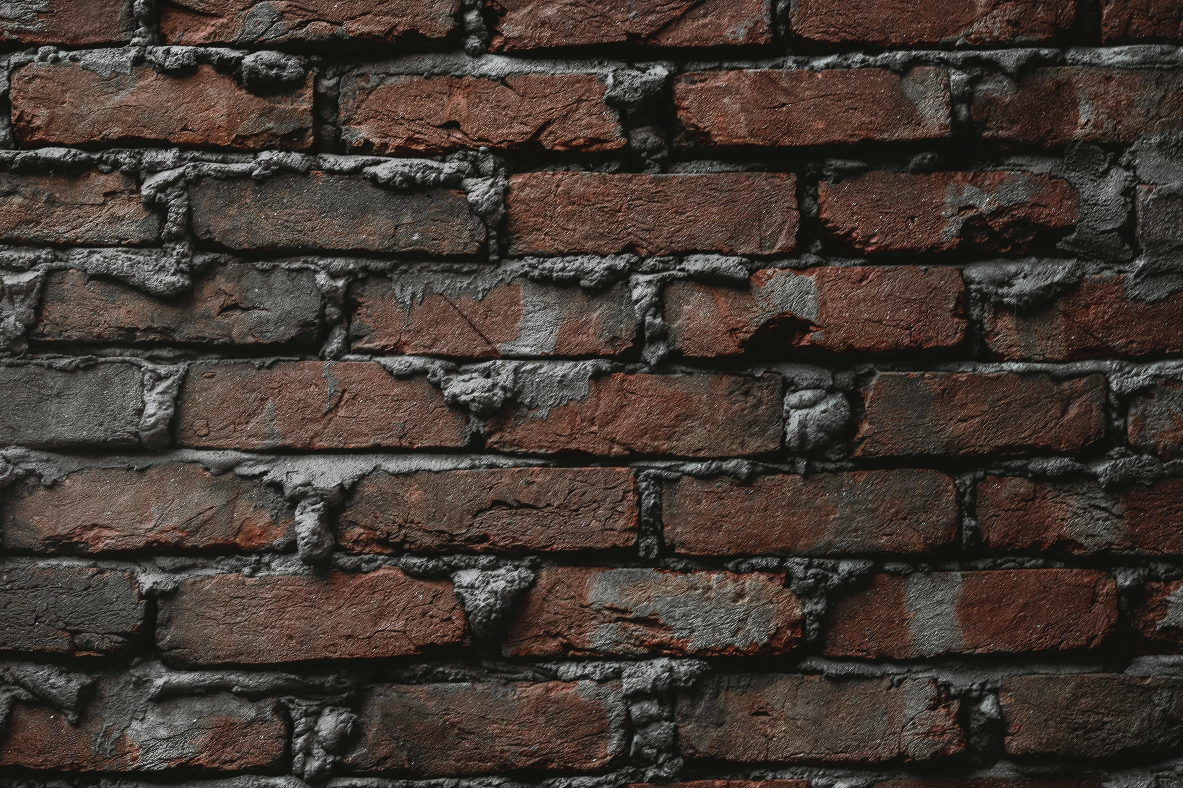 a close up of a brick wall with bricks