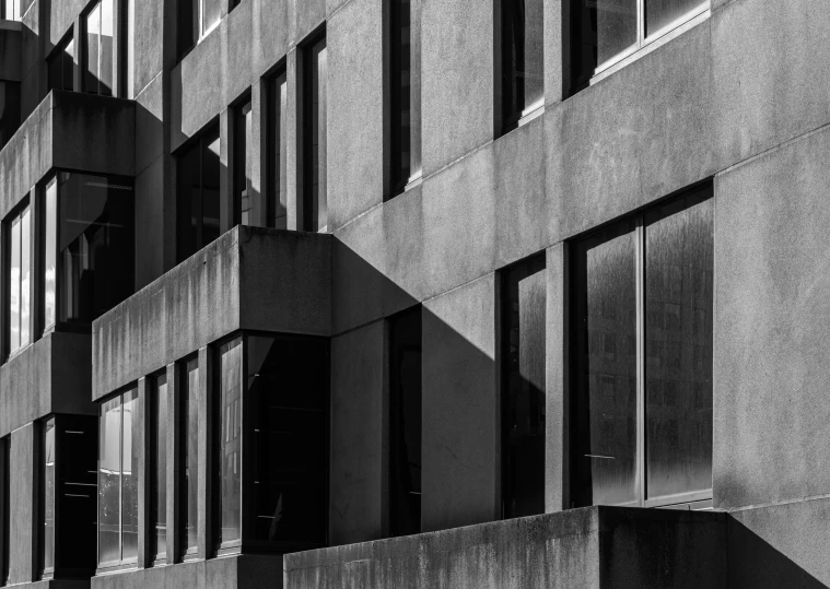 black and white pograph of a building on the street