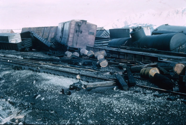 freight cars of various sizes and different materials on tracks