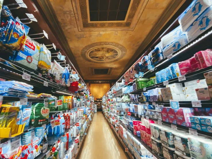 the ceiling of a market filled with boxes and cans