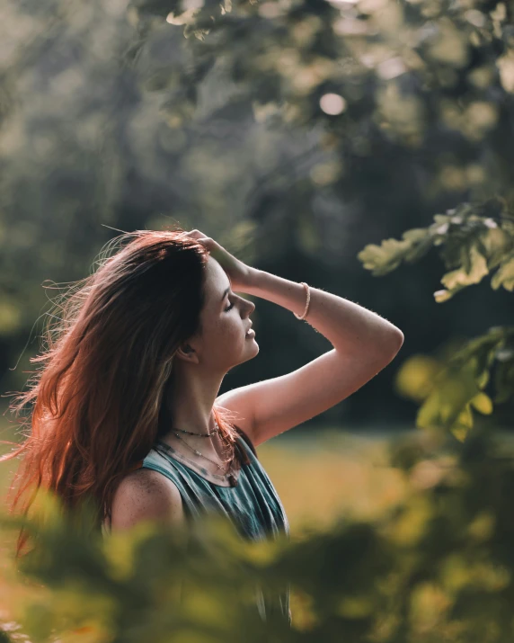 a woman that is looking up at soing