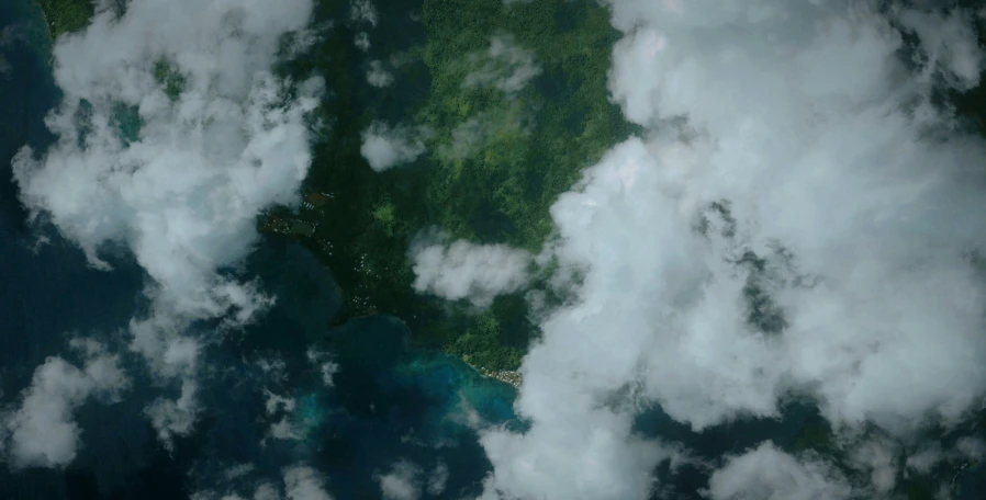 an image of the clouds above a body of water