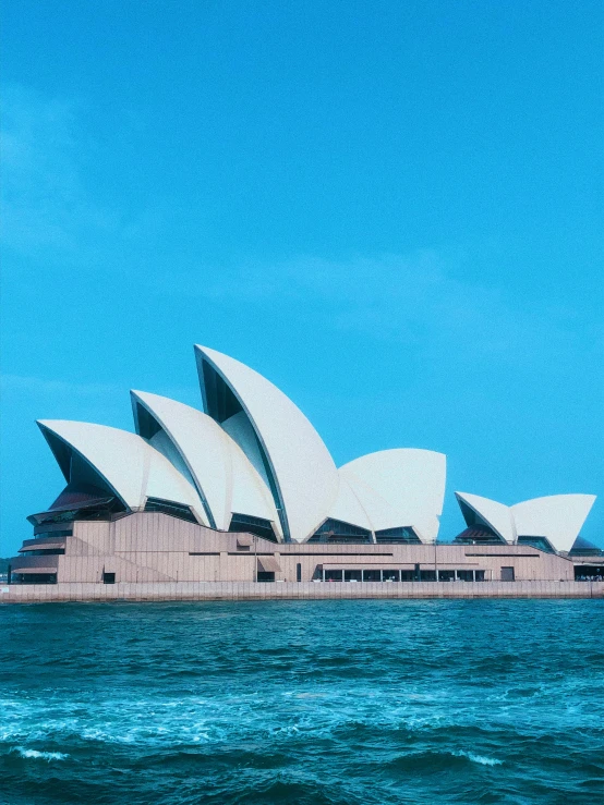 a big building that is by the ocean