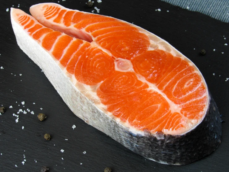 this raw fish has been placed on its belly