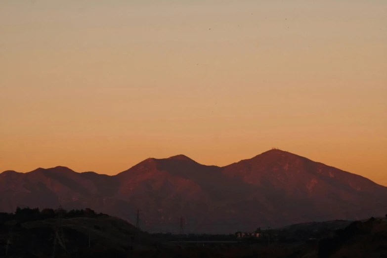 a group of large hills next to each other