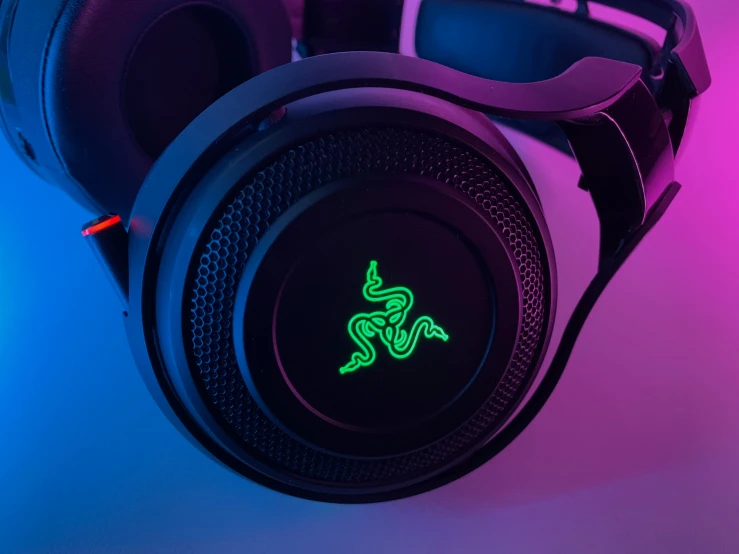 a glowing pair of headphones glows green