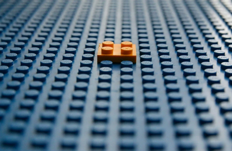 a lego man with number 50 on the left side