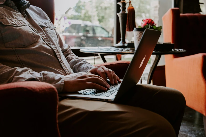 a person using a laptop on a table