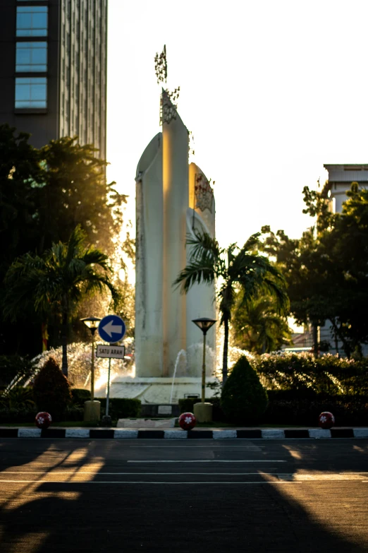 the water is spouting from the large fountain