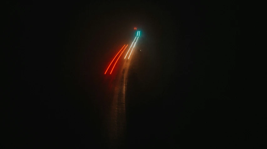 an airplane in flight, showing the lights