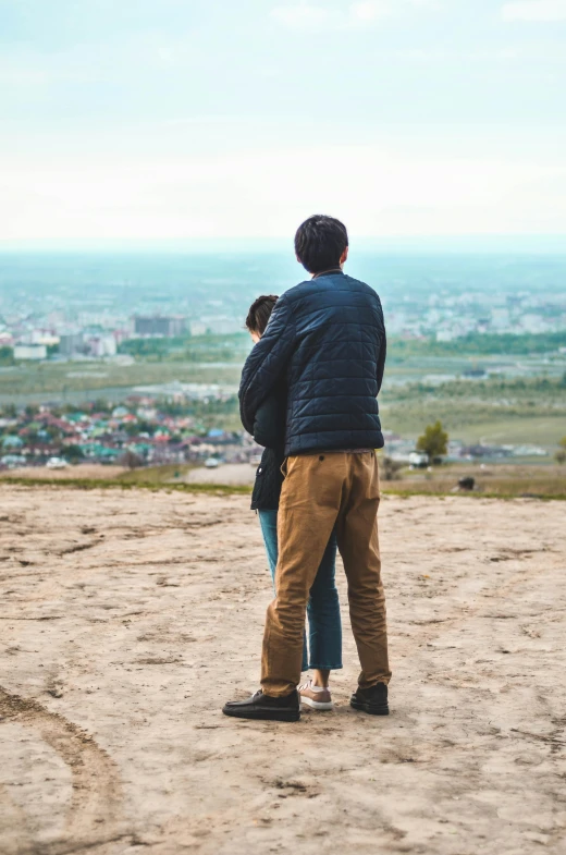 a man and woman standing near each other