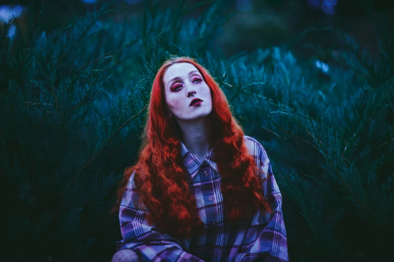 a young woman with red hair and freckled make up poses for a pograph
