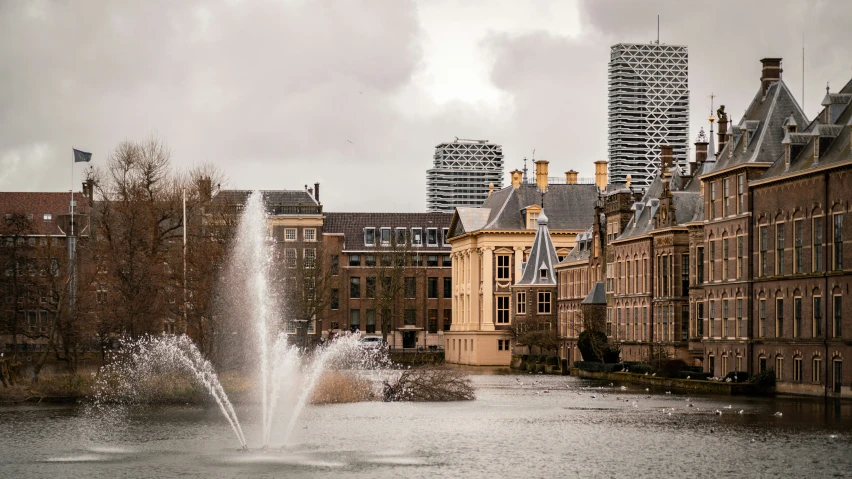 water spouts on the surface of an urban waterway