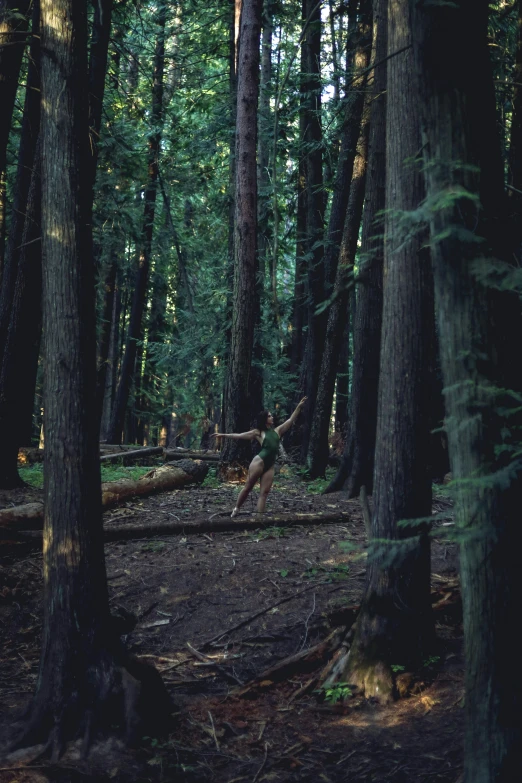 a person is riding a trail through the woods