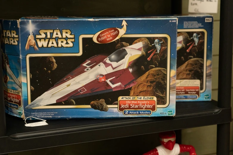 toy kits including a star wars fighter jet and a toy santa clause