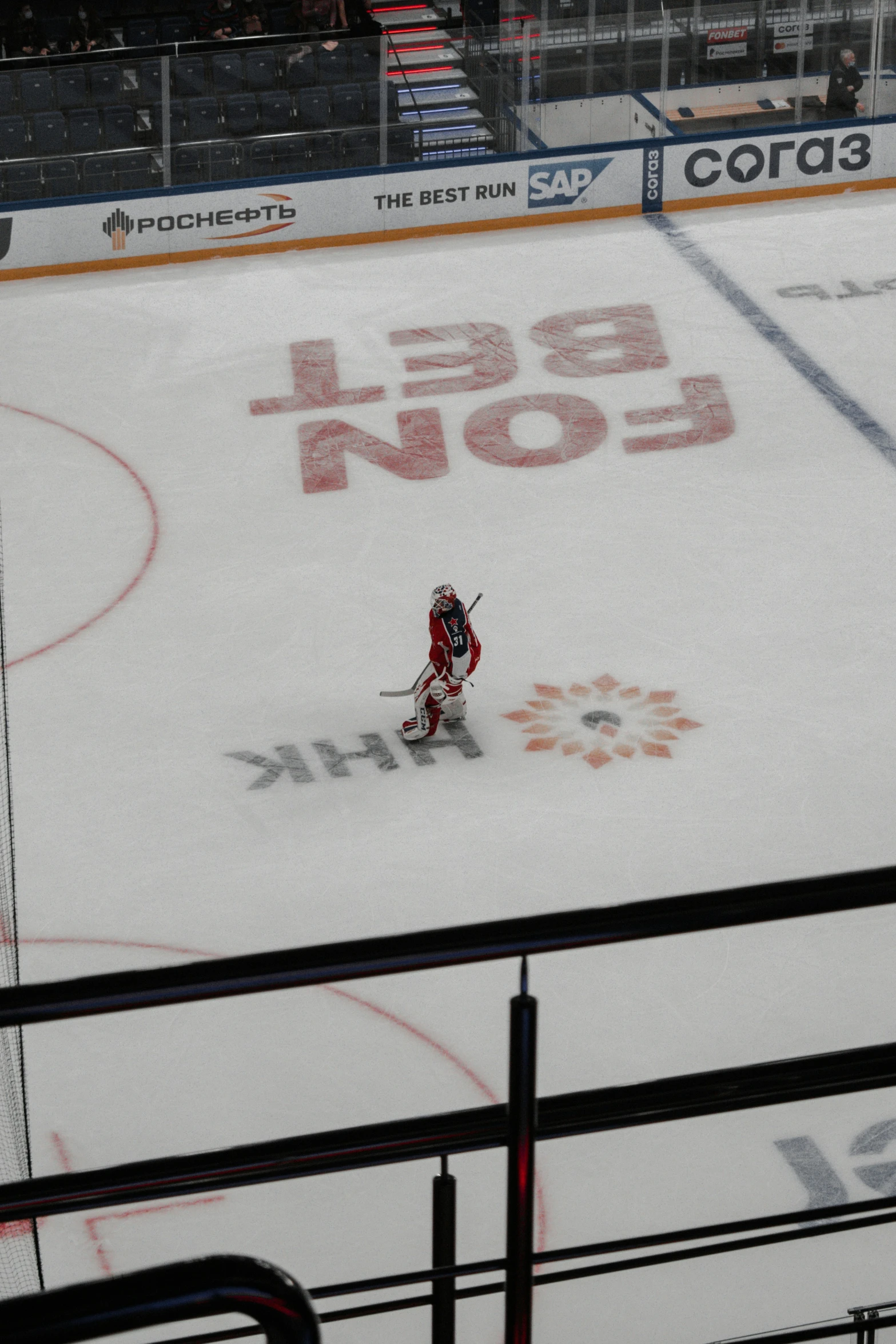 a hockey game being played on an ice rink