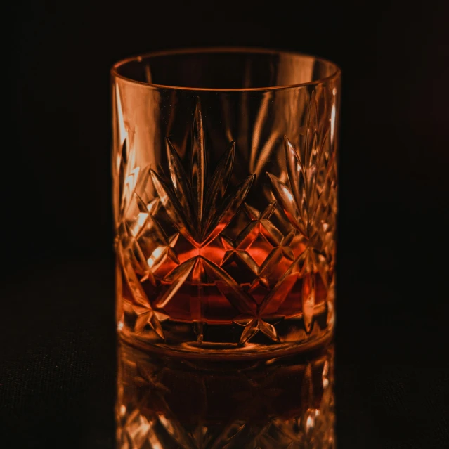 closeup of a crystal glass of whisky