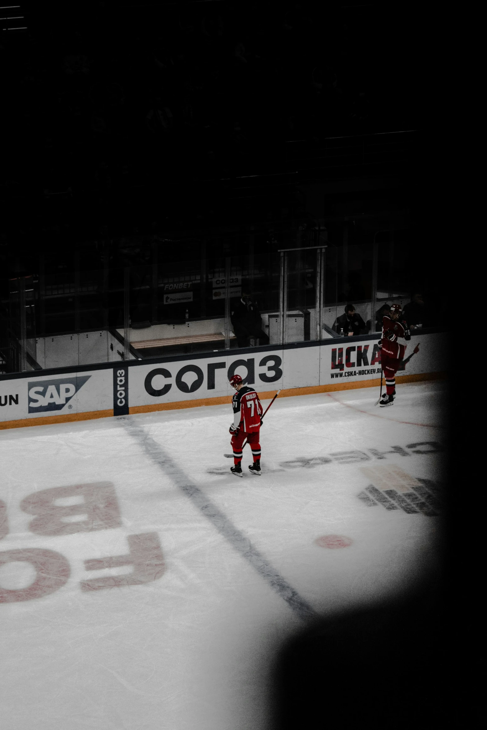 a hockey player on the ice with his stick