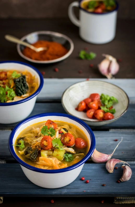 three bowls filled with different types of vegetables and vegetables in it