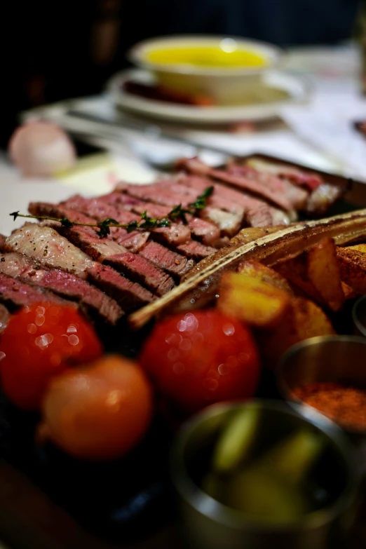 food is laying out on a tray next to other food