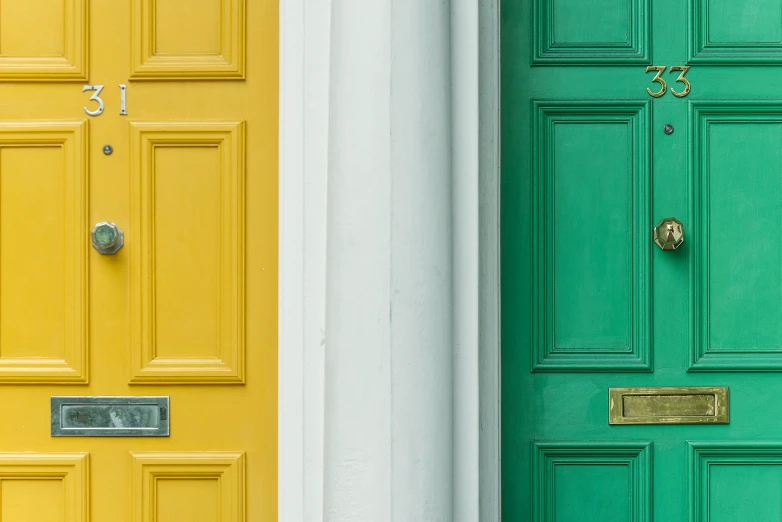 two bright yellow and green doors with the words'door s on them