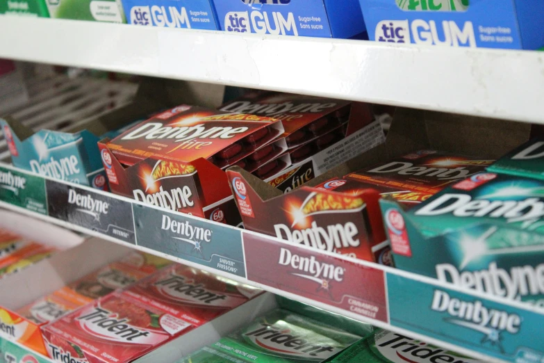 soda and gum on display in a cooler