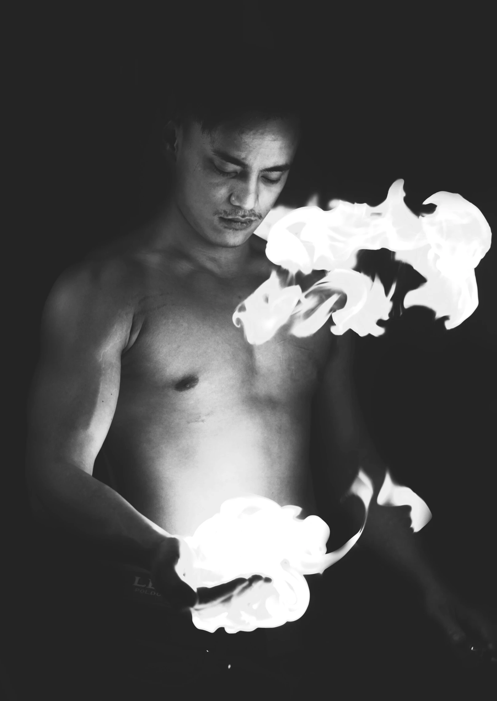 black and white pograph of a man holding flowers