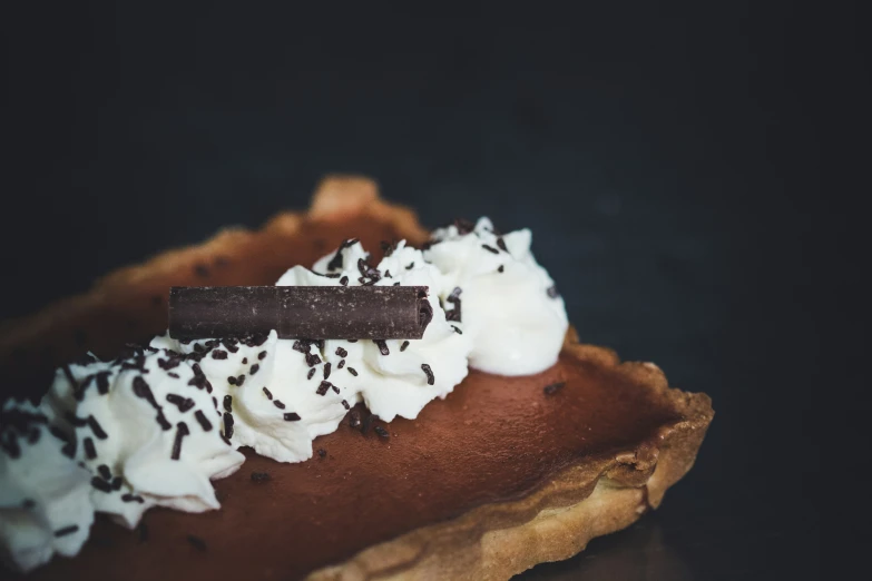 there is a desert on top of a slice of bread