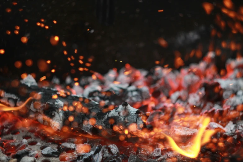 a fire pit with rocks and rocks around it