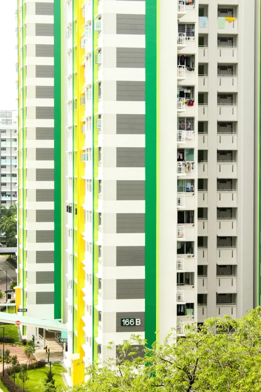 tall buildings with colored and striped balconies in the middle