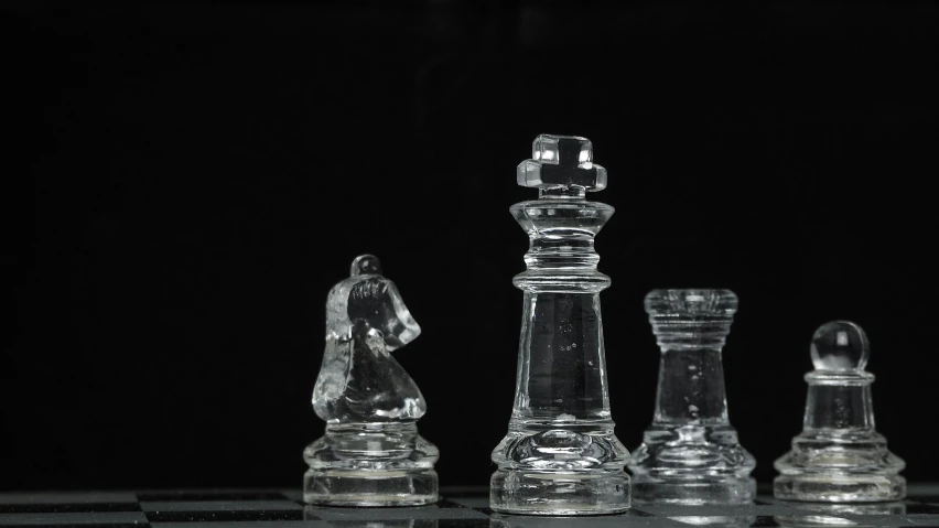 an image of glass figurines in the middle of a table