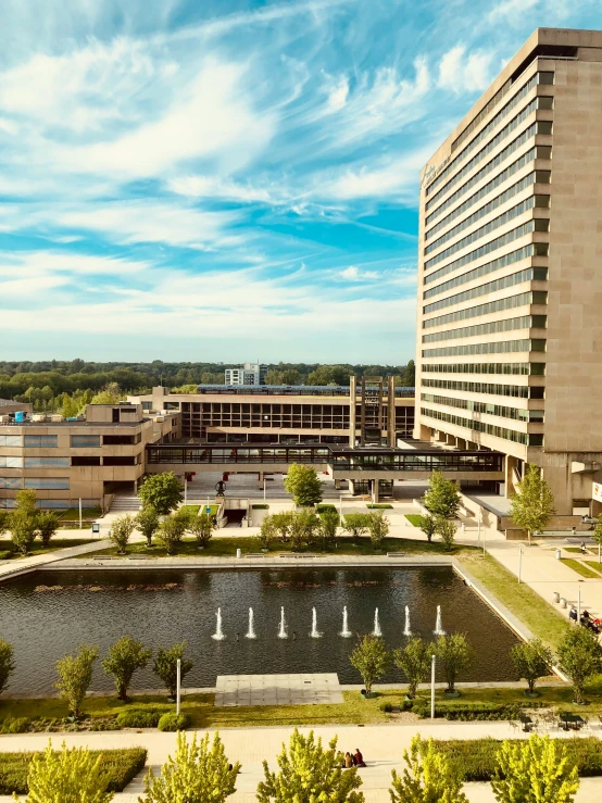 a building and a building with water in the center