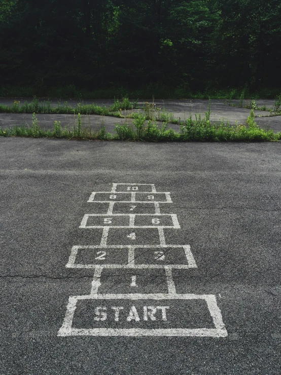 a parking lot with an asphalt pattern painted on it