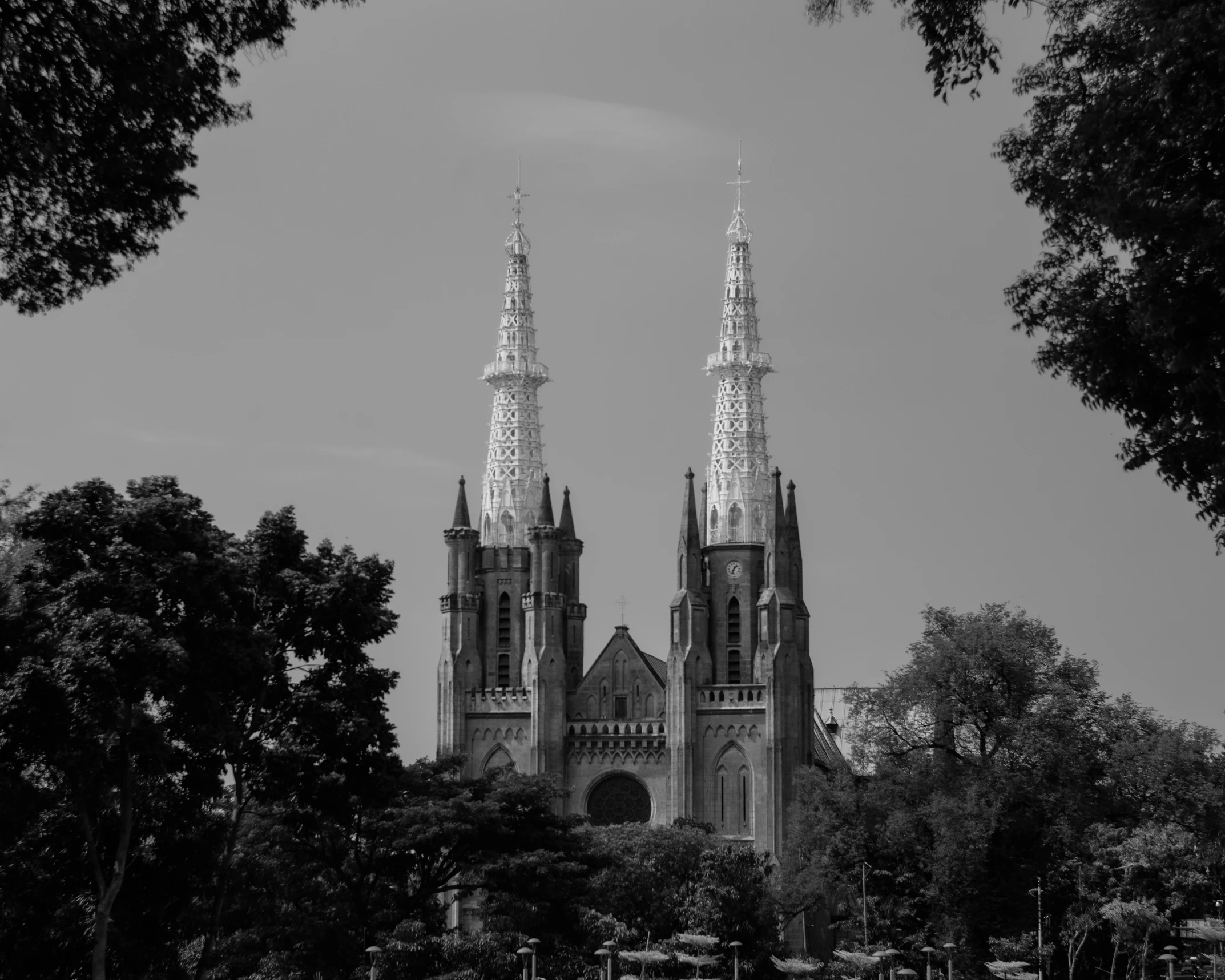 the church towers in black and white are visible from a distance