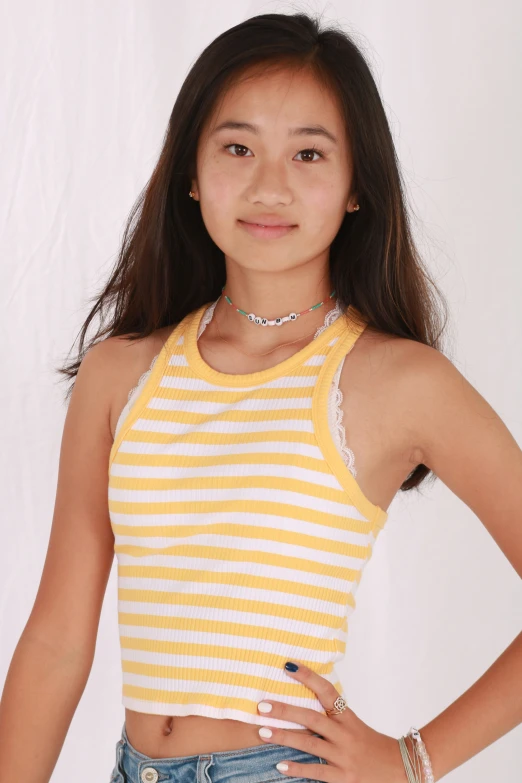 an asian woman wearing shorts and a top