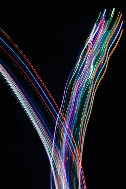 multicolored image of multiple lines in the dark