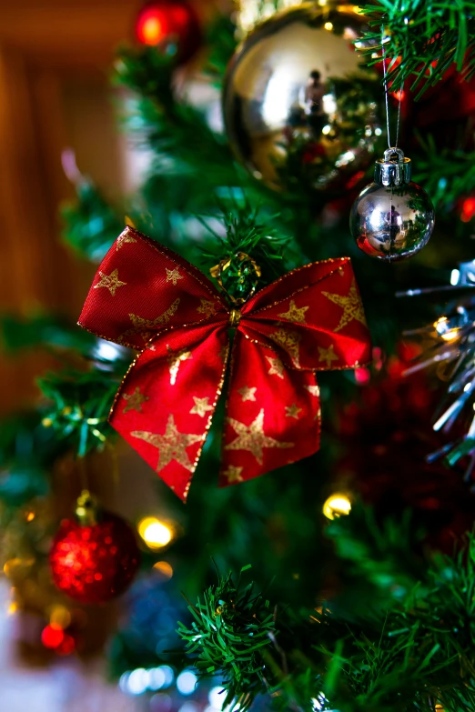 a christmas tree with ornaments and bauble