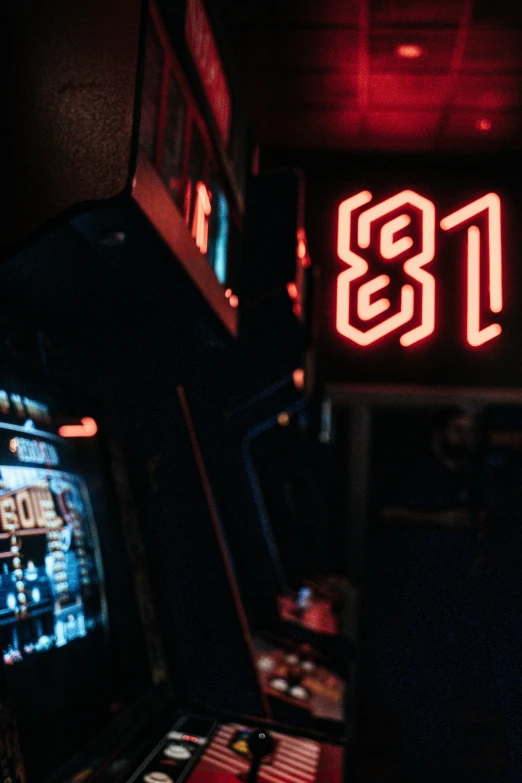 a neon sign with numbers and a controller inside