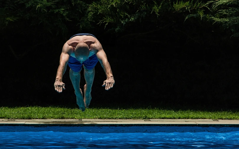 a person in the water with his back turned