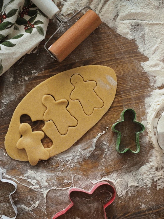 a cookie and cookies molding tools are laying on the counter