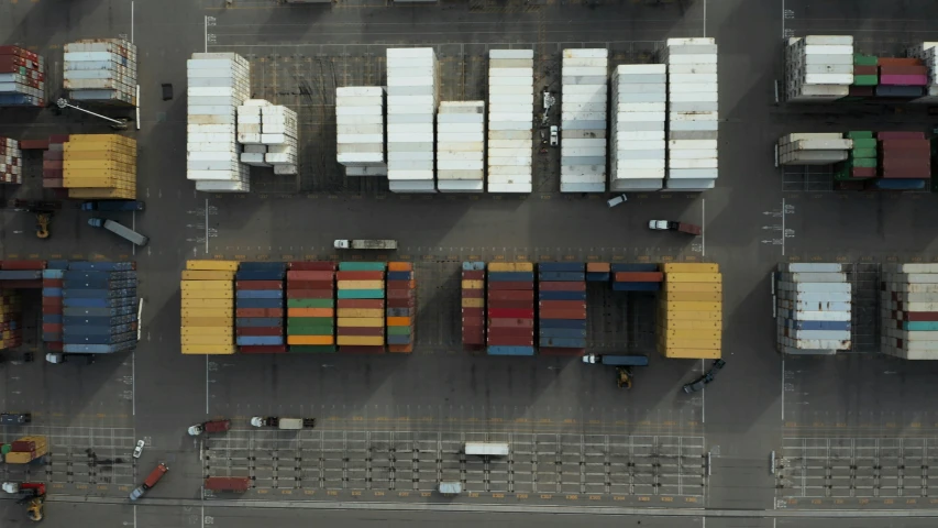 an aerial view of cargo containers on conveyor belt