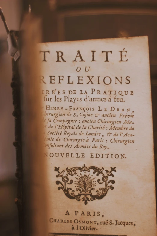 a book with an old french title on top