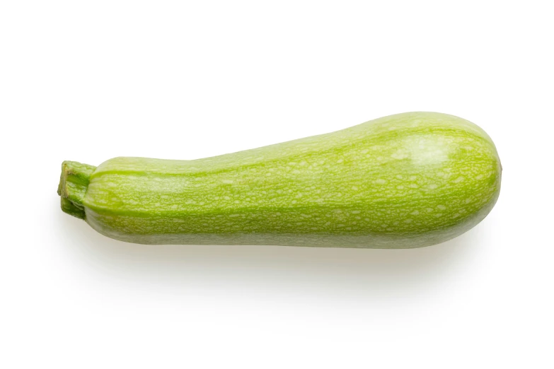 an up close s of an unpeeled zucchini vegetable