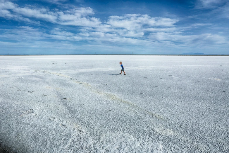 a lone person in a wide open plain