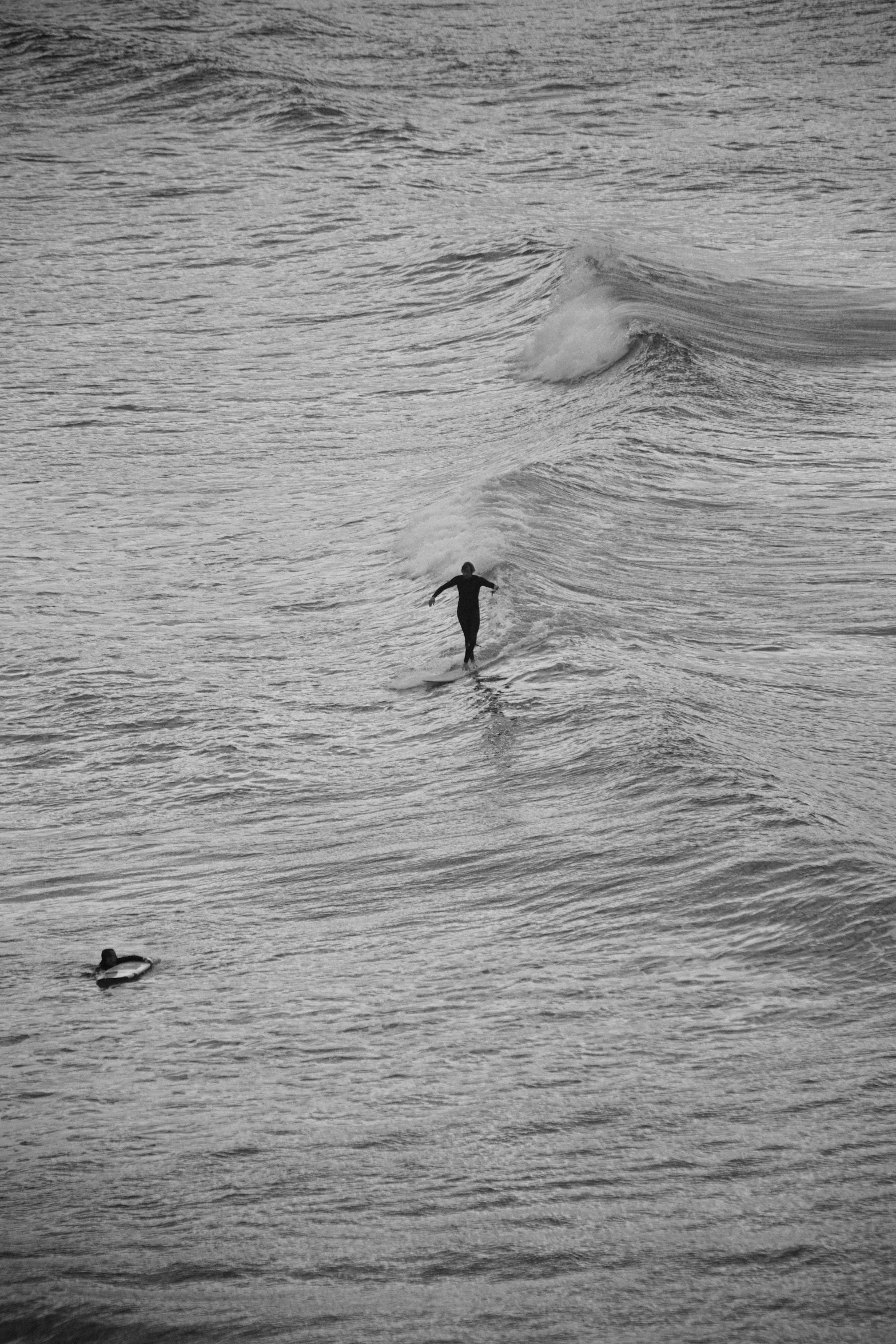 a surfer is out in the ocean with his board